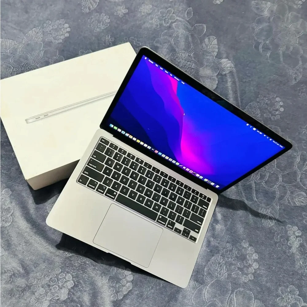 Apple Laptop in Silver with Black Keyboard